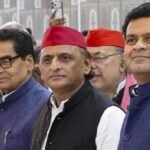 akhilesh- sp- with-rajya-sabha-pick-who-is-reliance-executive-dhanraj-nathwan