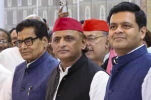 akhilesh- sp- with-rajya-sabha-pick-who-is-reliance-executive-dhanraj-nathwan